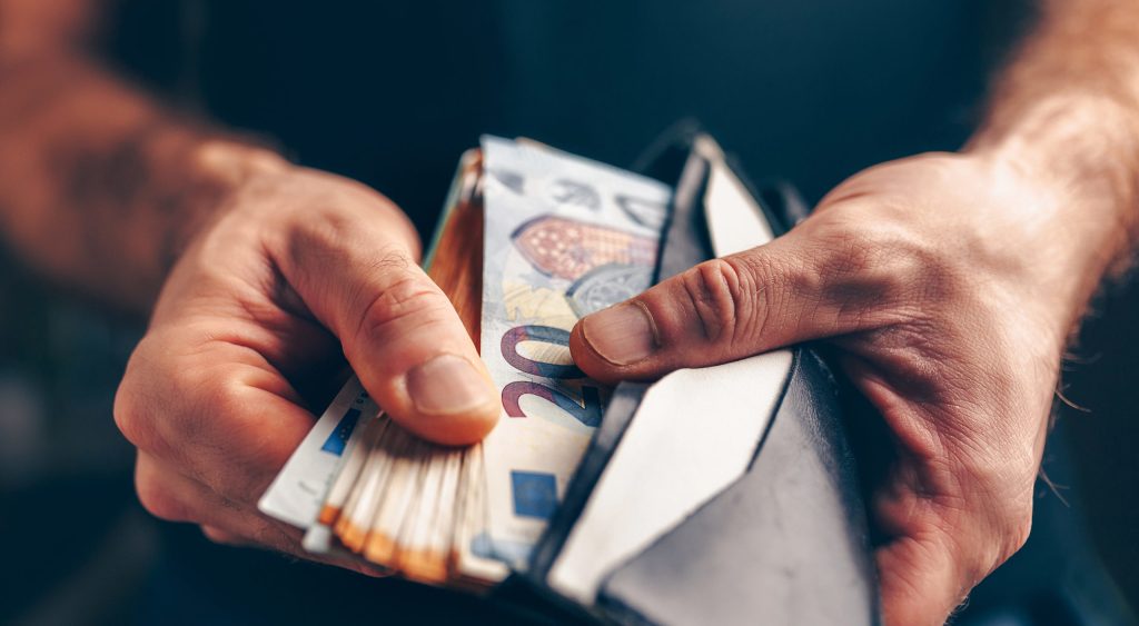 Stack of euros in a wallet - purchasing power