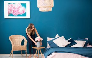 Woman with flowers at home