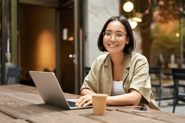 portrait-smiling-girl-glasses-sitting-600nw-2238411491